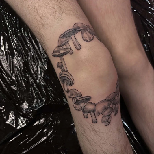 Medium Black and Grey Mushroom Chain on Men Knee Tattoo by @ebonytattoo