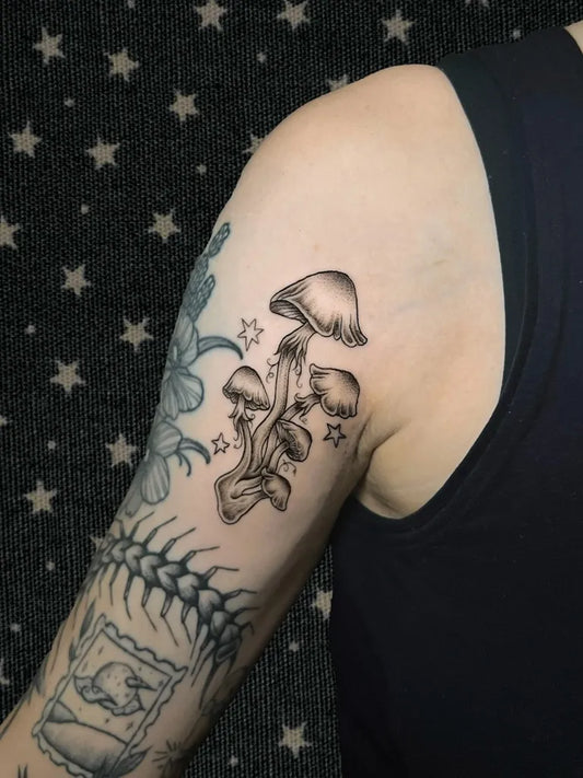 Medium Black and Grey Mushroom Cluster on Women Arm Tattoo by @spacecrvfts