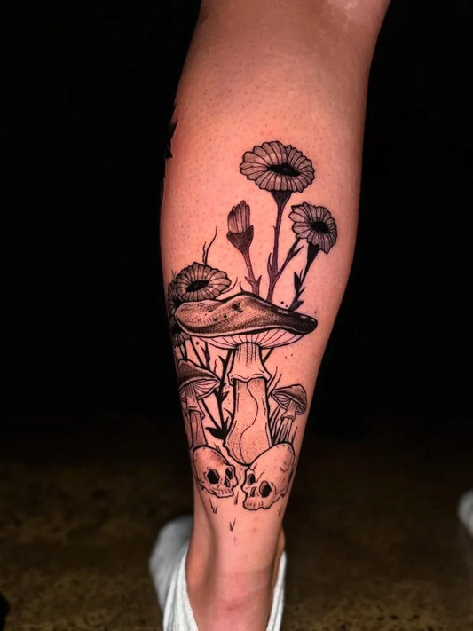 Medium Black and Grey Mushroom Flowers Skulls on Women Leg Tattoo by @prajworldart