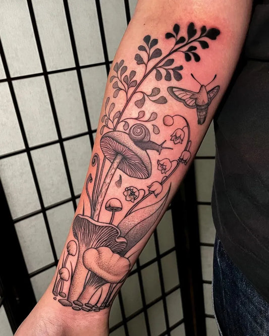 Medium Black and Grey Mushroom Snail Arm Sleeve Tattoo by @caravanessa.tattoo