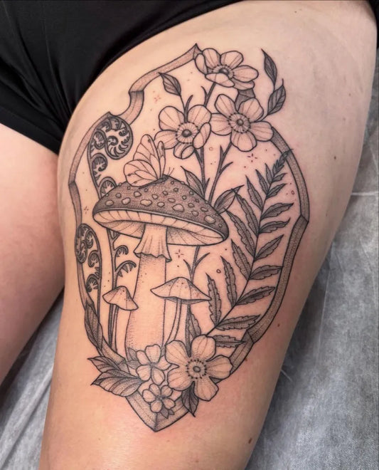 Medium Black and Grey Mushroom and Flowers on Women Thigh Tattoo by @noelleseraphine