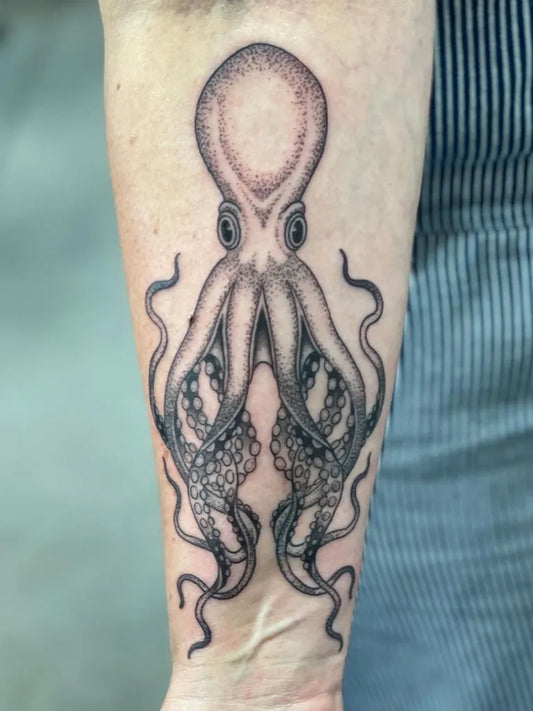 Medium Black and Grey Octopus Tattoo on Men Arm by @fortunetellerportland