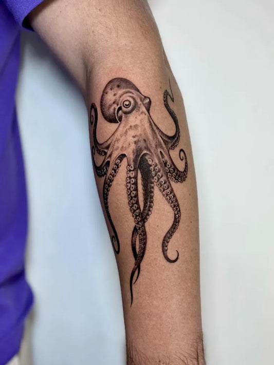 Medium Black and Grey Octopus Tattoo on Men Arm by @yantinotattoo_ubud