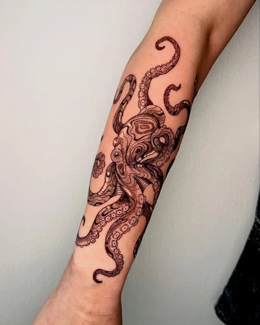 Medium Black and Grey Octopus Tattoo on Women Arm by @bloodkimchi