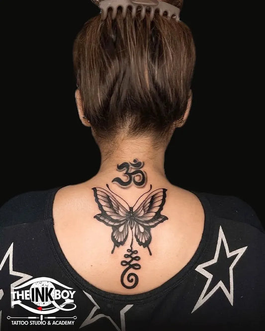Medium Black and Grey Om Butterfly and Celtic Knot Spiritual Tattoo on Women Back by @theinkboyindia