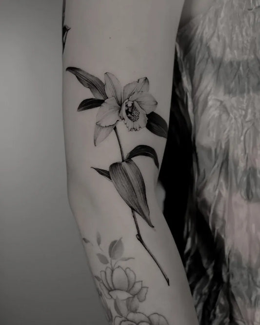 Medium Black and Grey Orchid and Buds Tattoo on Women Arm by @yo_soy_vago