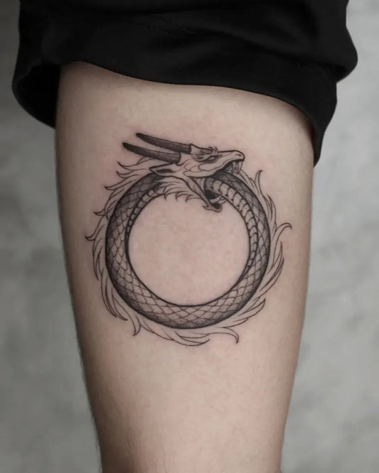 Medium Black and Grey Ouroboros Dragon Tattoo on Women Thigh by @aleksaenz