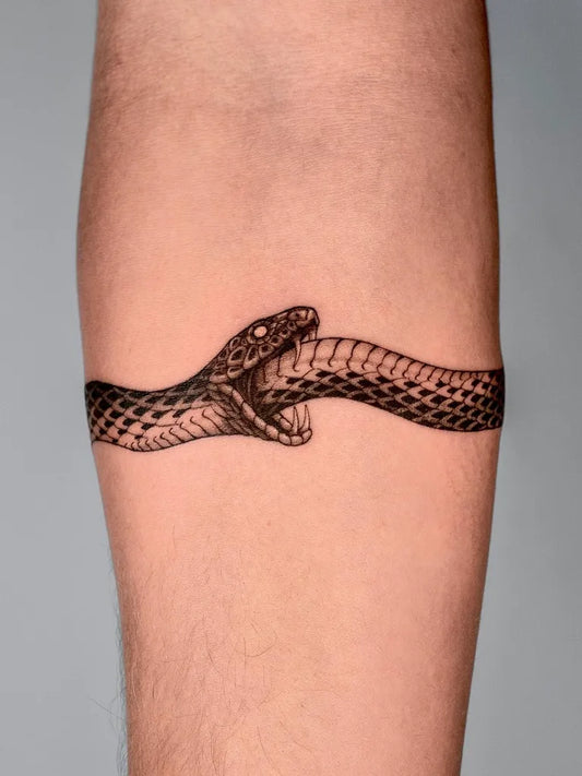 Medium Black and Grey Ouroboros Tattoo on Men Arm Wrap by @kabitatt