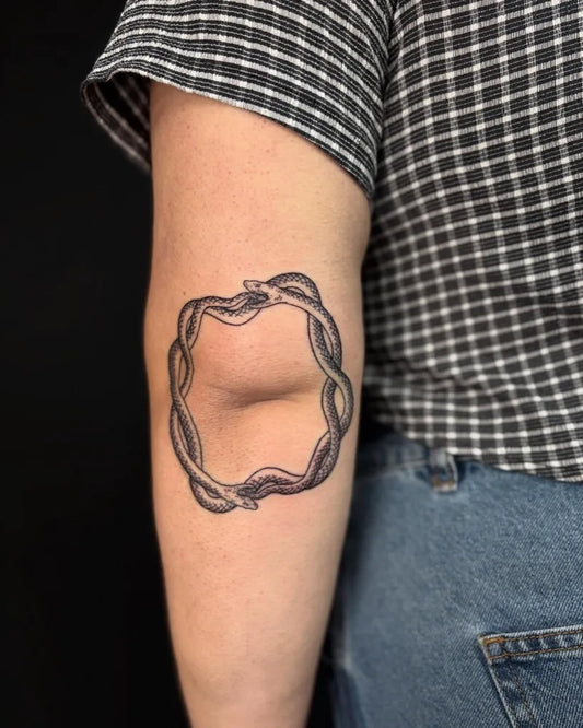 Medium Black and Grey Ouroboros Tattoo on Women Arm by @paynes____grey