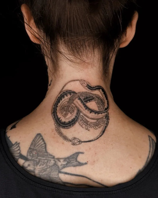 Medium Black and Grey Ouroboros Tattoo on Women Neck by @nature_obscure