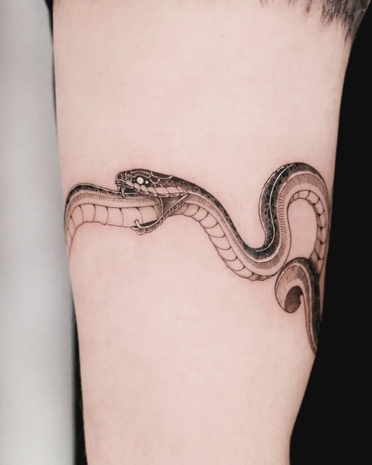 Medium Black and Grey Ouroboros Tattoo on Women Thigh by @pobitattoo