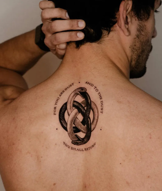 Medium Black and Grey Ouroboros with Text Tattoo on Men Back by @t.a.e_t