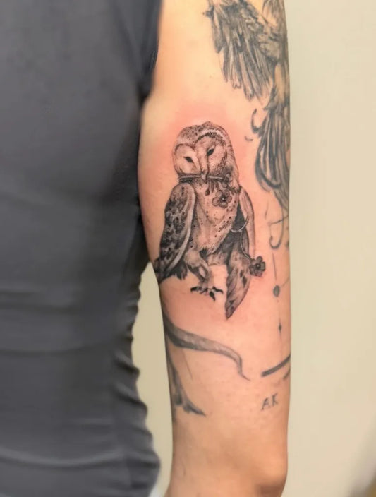 Medium Black and Grey Owl Tattoo on Men Arm by @nas.inkwell