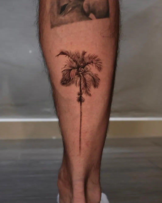 Medium Black and Grey Palm Tree Tattoo on Men Leg by @chunntattoo
