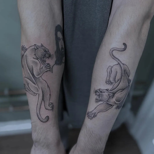 Medium Black and Grey Panther Tattoo on Men Arm by @amspittattoo