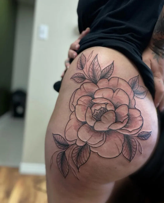 Medium Black and Grey Peony Flower Tattoo on Women Hip by @the.autumnbreeze