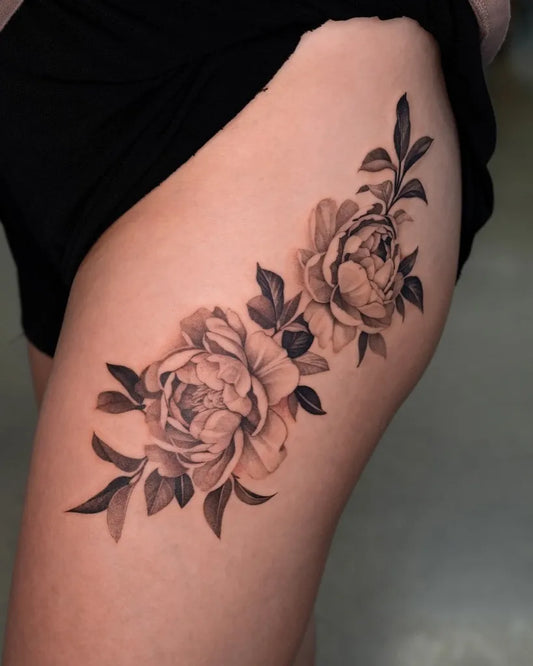 Medium Black and Grey Peony Flowers and Leaves on Women Thigh Tattoo by @zeetattoo