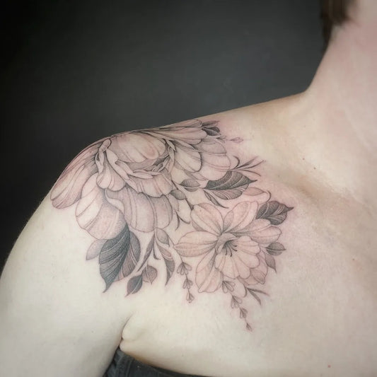 Medium Black and Grey Peony and Daffodil Tattoo on Women Shoulder by @daisymcqueen