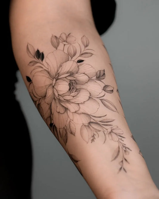 Medium Black and Grey Peony and Leaves on Women Arm Tattoo by @amandahess.ink