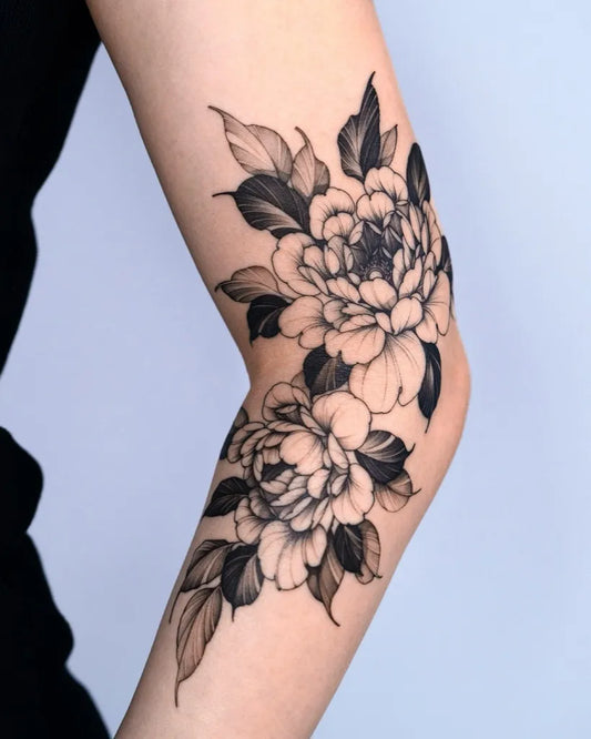 Medium Black and Grey Peony and Leaves on Women Arm Tattoo by @dobby.house