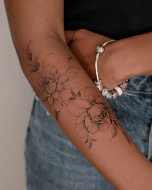 Medium Black and Grey Peony and Leaves on Women Arm Tattoo by @la.source.tattoo