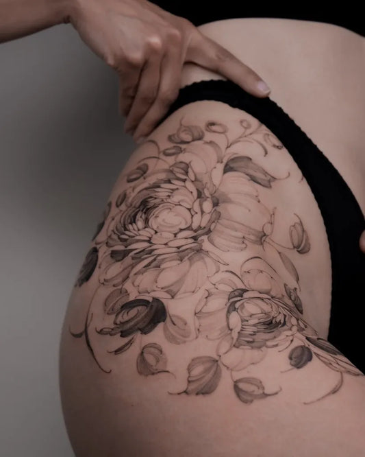 Medium Black and Grey Peony and Leaves on Women Hip Tattoo by @anastasiahelfer