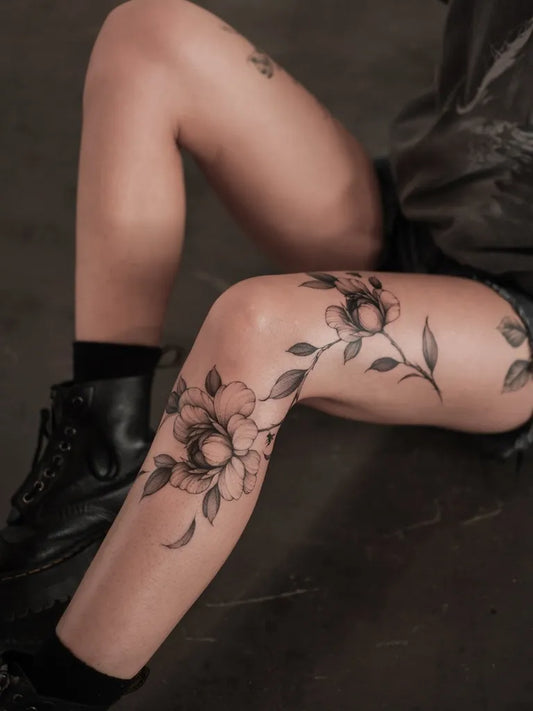 Medium Black and Grey Peony and Leaves on Women Thigh Tattoo by @betstattoo