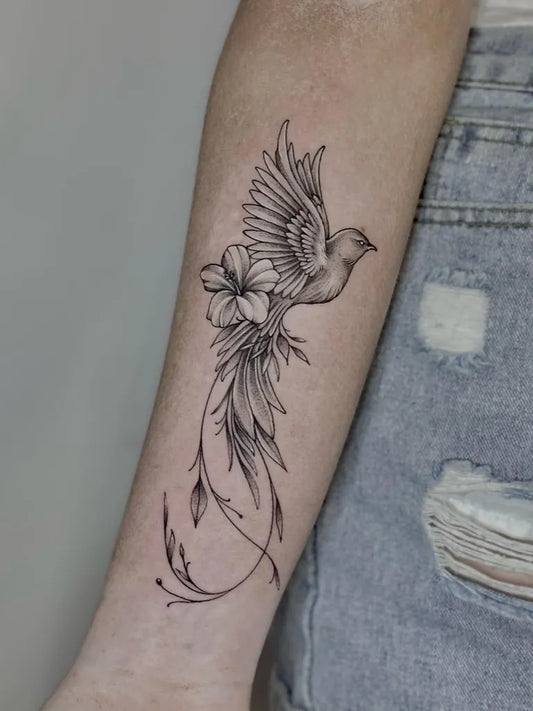 Medium Black and Grey Phoenix Bird Tattoo on Women Arm by @yantinotattoo_ubud