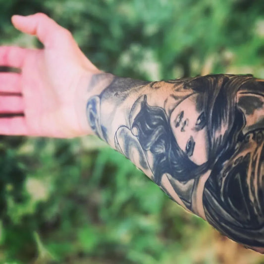 Medium Black and Grey Pin Up Girl Tattoo on Men Arm by @fulltattoos