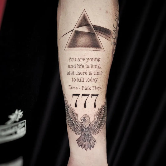 Medium Black and Grey Pink Floyd Prism and Eagle with 777 Tattoo on Men Arm by @sobrinho.oficial1