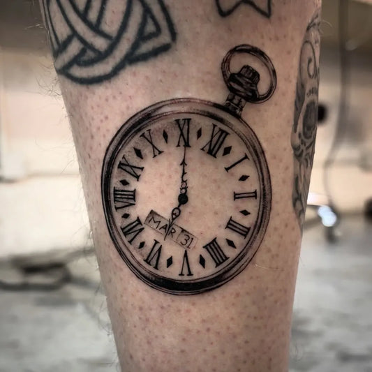 Medium Black and Grey Pocket Watch Clock Tattoo on Men Leg by @tattoo.priscillaleung