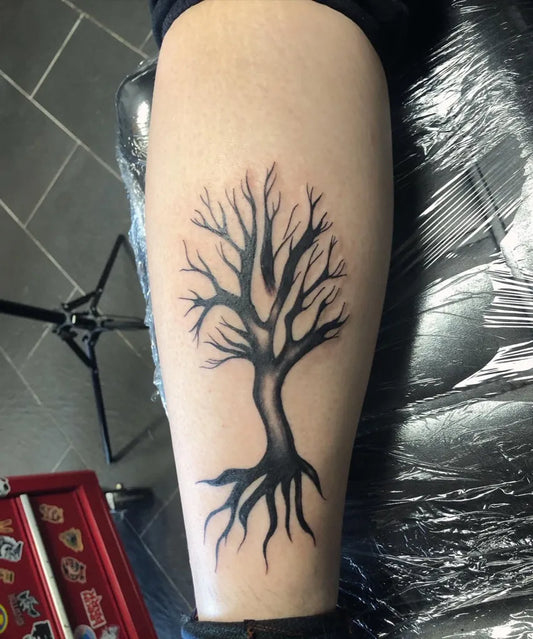 Medium Black and Grey Poison Tree on Men Leg Tattoo by @rosieetattoos