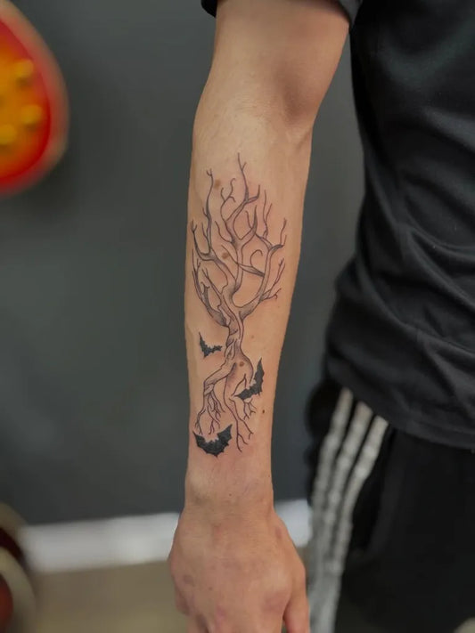 Medium Black and Grey Poison Tree with Bats on Men Arm Tattoo by @sterlingtattoosandpiercings