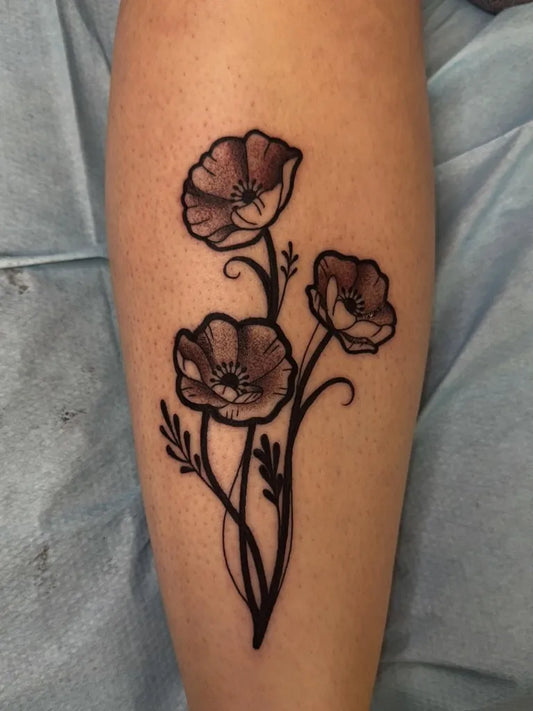 Medium Black and Grey Poppy Flowers Tattoo on Women Leg by @laurito_tattoo