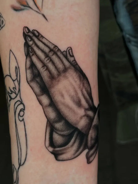 Medium Black and Grey Praying Hands Tattoo on Men Arm by @ajimeneztattoo