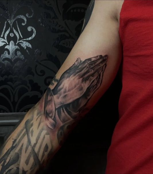 Medium Black and Grey Praying Hands Tattoo on Men Arm by @lupixiepreuss
