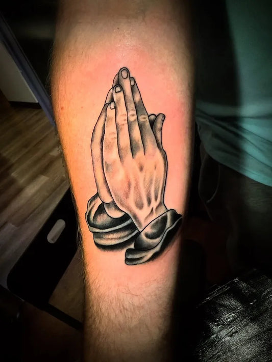 Medium Black and Grey Praying Hands Tattoo on Men Forearm by @james.tats