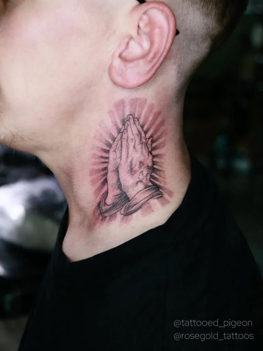Medium Black and Grey Praying Hands with Rays Tattoo on Men Neck by @rosegold_tattoos