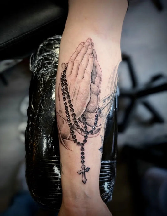 Medium Black and Grey Praying Hands with Rosary Tattoo on Men Arm by @jb_tatt