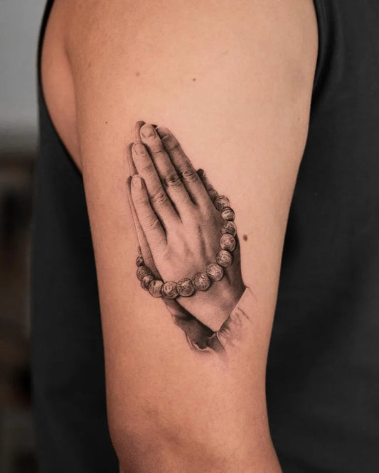 Medium Black and Grey Praying Hands with Rosary Tattoo on Men Arm by @oottatjac