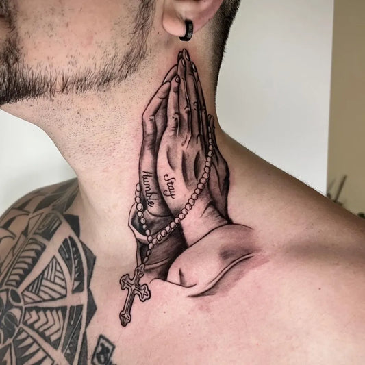 Medium Black and Grey Praying Hands with Rosary Tattoo on Men Neck by @ludger_houdini.ink