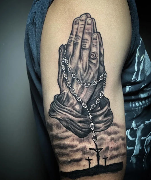 Medium Black and Grey Praying Hands with Rosary and Crosses Tattoo on Men Arm by @niro_niro