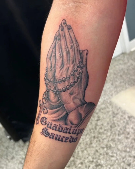 Medium Black and Grey Praying Hands with Rosary and Guadalupe Tattoo on Men Arm by @jluvink