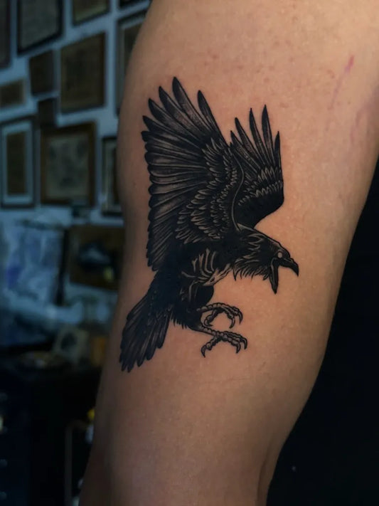Medium Black and Grey Raven on Men Arm Tattoo by @camille.ninelives