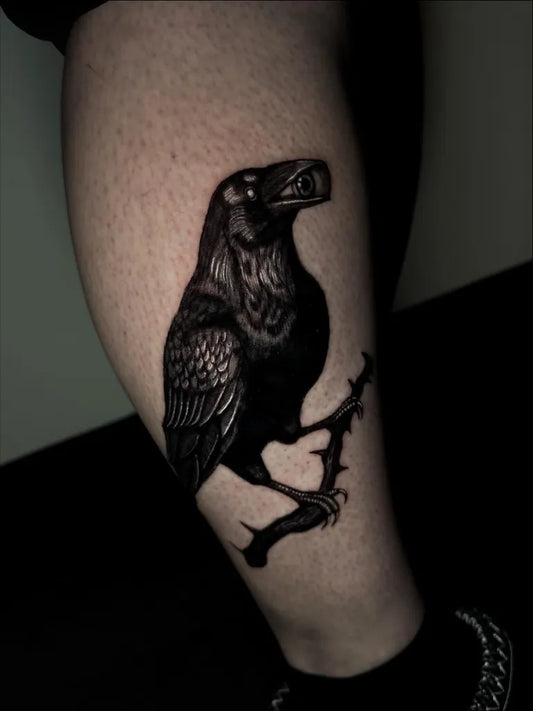 Medium Black and Grey Raven on Thorny Branch on Men Leg Tattoo by @davidp_tattoos