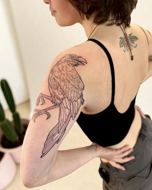 Medium Black and Grey Raven with Flowers on Women Shoulder Tattoo by @vietnguyenart
