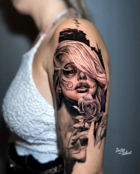 Medium Black and Grey Realism Santa Muerte with Rose Tattoo on Women Shoulder by @_doctor_robert_tattooer
