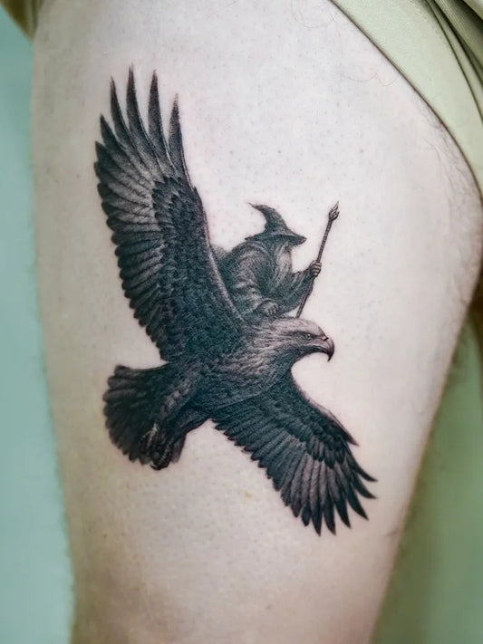 Medium Black and Grey Riding Eagle Tattoo on Men Thigh by @modoink_reagan