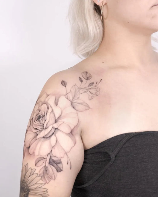 Medium Black and Grey Rose and Leaves Tattoo on Women Shoulder by @veroterea