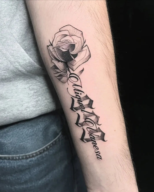 Medium Black and Grey Rose and Script Tattoo on Men Arm by @mr.zumi_tattoo